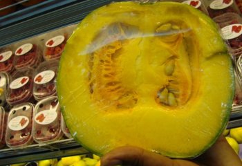 Pumpkin cut in to halves in Nairobi market, Kenya. Ⓒ Adeka et al., Foods of Nairobi people, 2007 Pumpkin cut in to halves in Nairobi market, Kenya. Ⓒ Adeka et al., Foods of Nairobi people, 2007